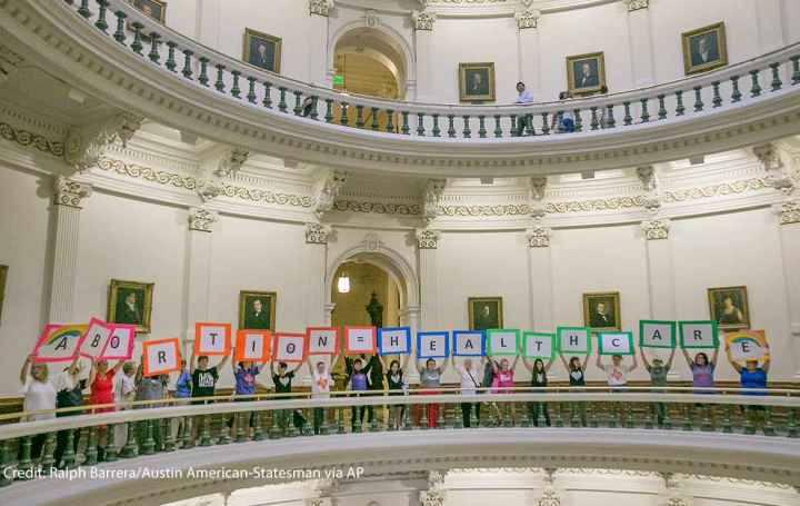 Photo: Representatives of the Trust, Respect, Access Coalition, holding multicolored signs spelling out ABORTION=HEALTHCARE, gathered in the Texas Capitol Rotunda Thursday afternoon July 27, 2017 to voice their opposition to abortion legislation being...
